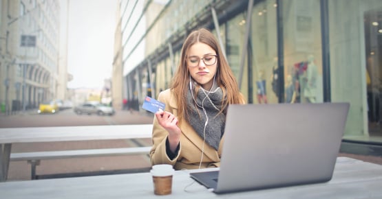 woman-in-brown-coat-holding-a-bank-card-3784391 (3)