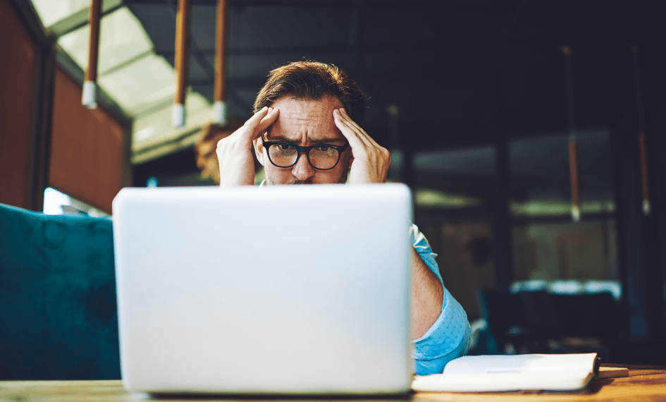 ecommerce-merchant-looking-at-laptop